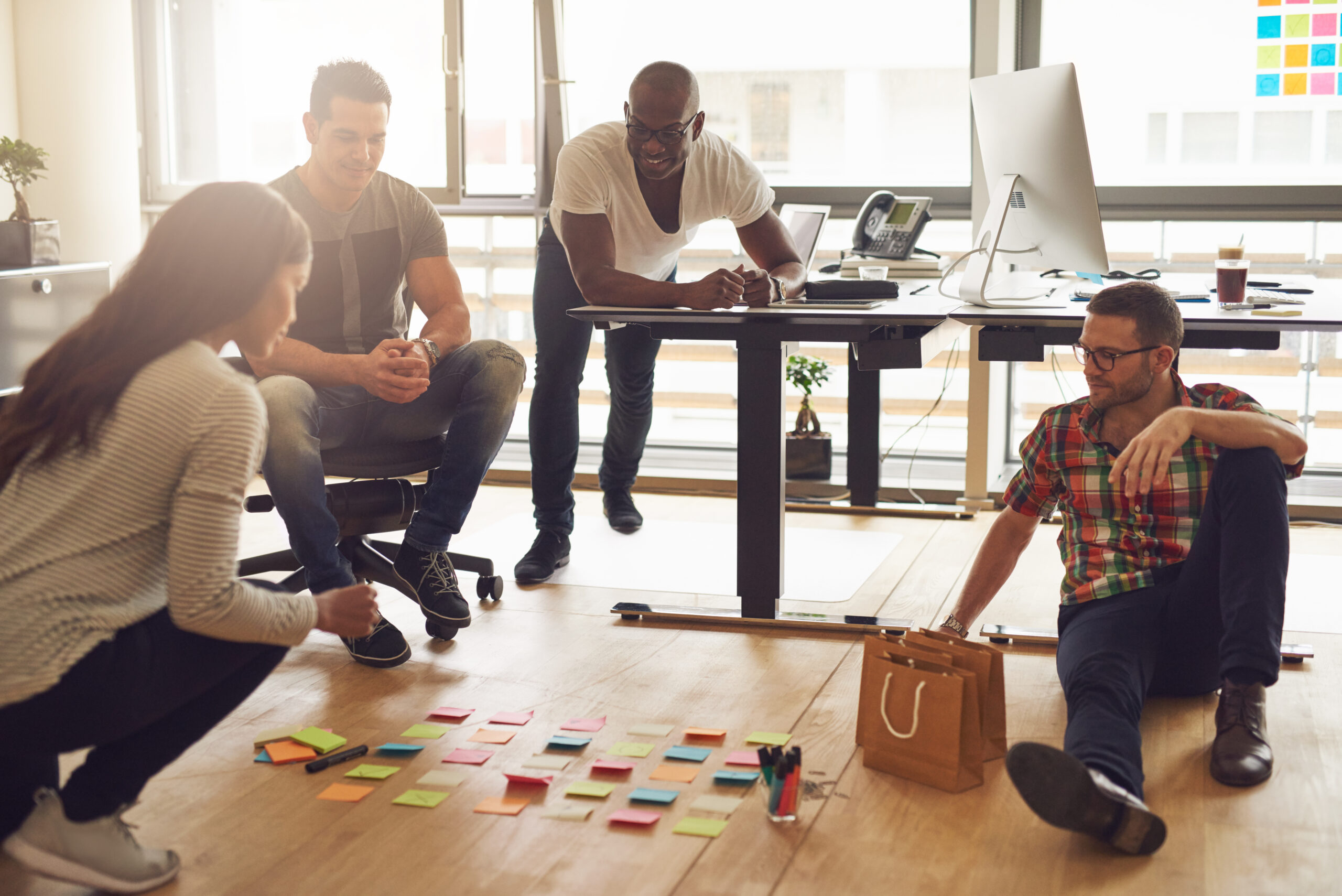 Employees working on executing a plan